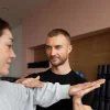 patient-doing-physical-rehabilitation-helped-by-therapists-scaled.jpg